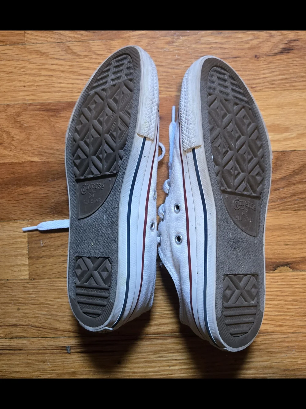 Converse White Low Top Sneakers with Red Trim